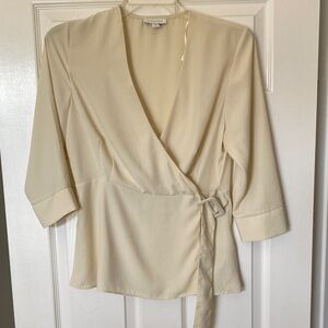 In excellent condition Topshop Cream was hay Wrap Blouse